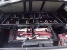 All batteries arranged where back seat w