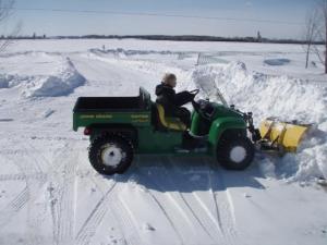 my son plowing snow